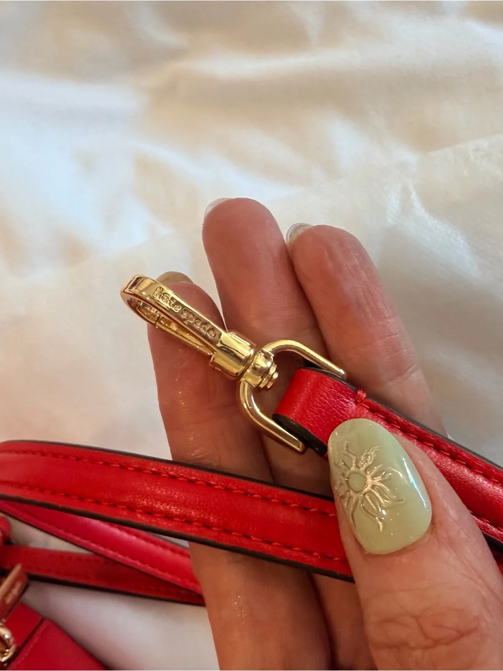 kate spade red heart-shaped top-handle bag with gold-tone logo